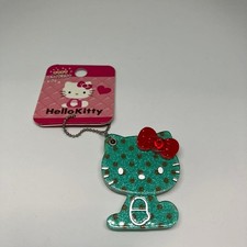 Specchio scorrevole Hello Kitty punto menta piperita, 2013, 5x4 cm, suono grintoso,