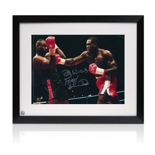 Frank Bruno Signed Boxing Photo: Fighting McCall. Framed