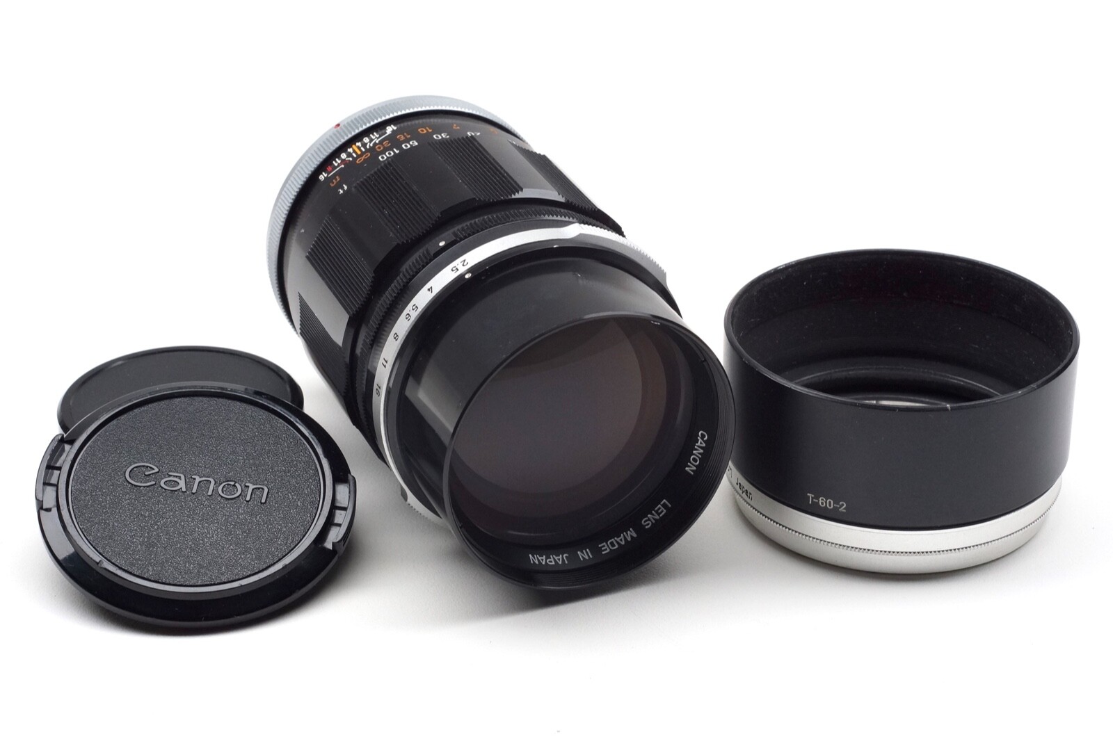 Canon 135mm f2.5 FL Lens with Caps and Hood Included