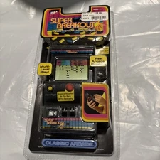 Super Breakout Electronic Handheld Game by MGA Entertainment New Old Stock