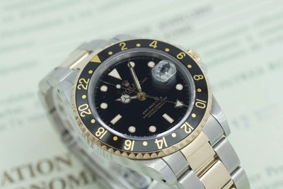 Rolex GMT Master II 16713 Stahl/Gold Papiere