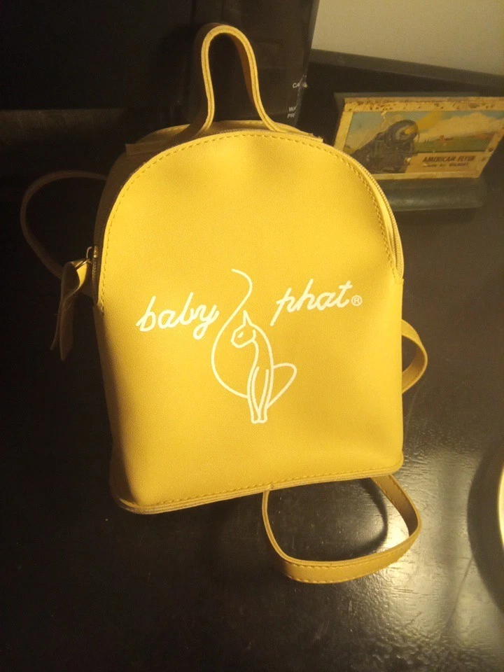 Baby Phat Backpack in Yellow Slide one or two? ?? ⠀ The yellow Motherland Backpack  main image 2