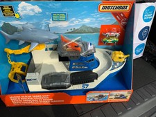 matchbox shark ship floats in water and rescue on land