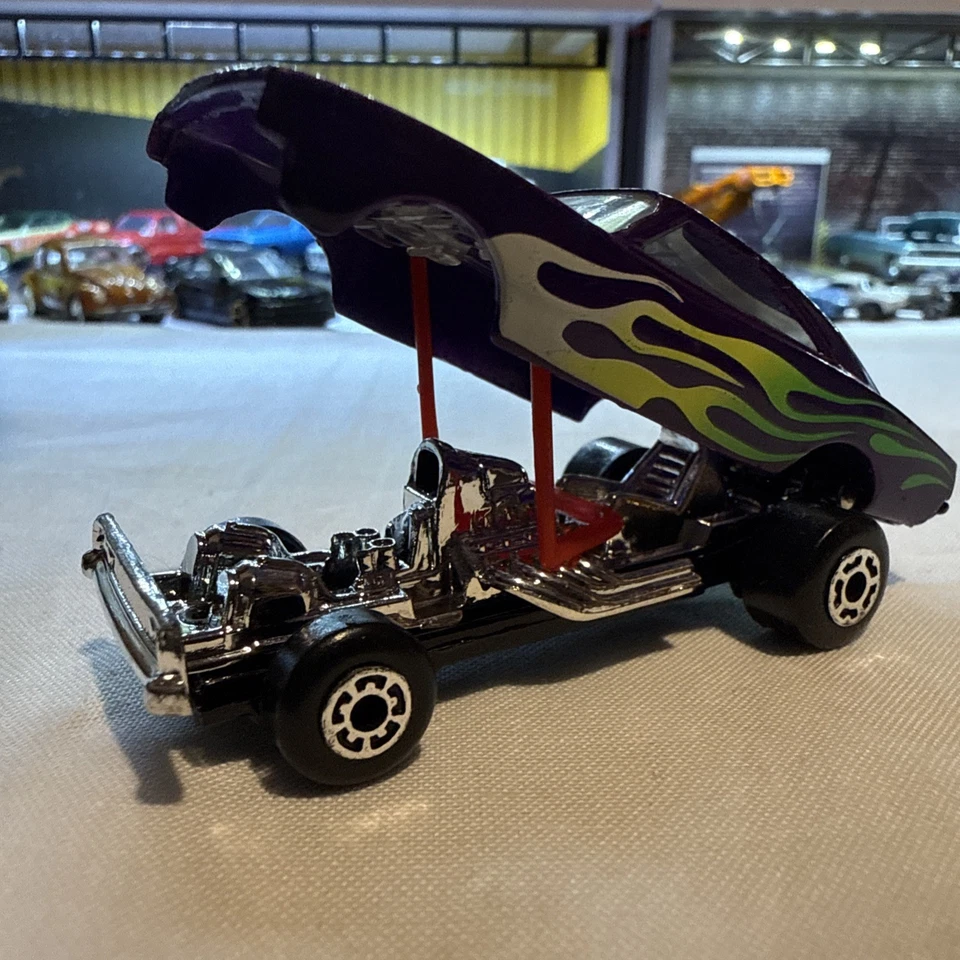 CARGADOR MATCHBOX NARANJA CÁSCARA DODGE CARAMELO PÚRPURA VERDE-BLANCO LLAMAS SUELTAS Foto 4 de 4