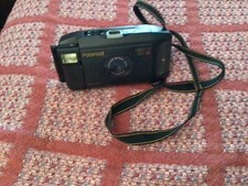 Polaroid camera, captiva slr se,auto focus, w/f12, 107 mem. lens