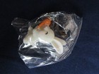 tiny white plastic bunny in package — photo 6