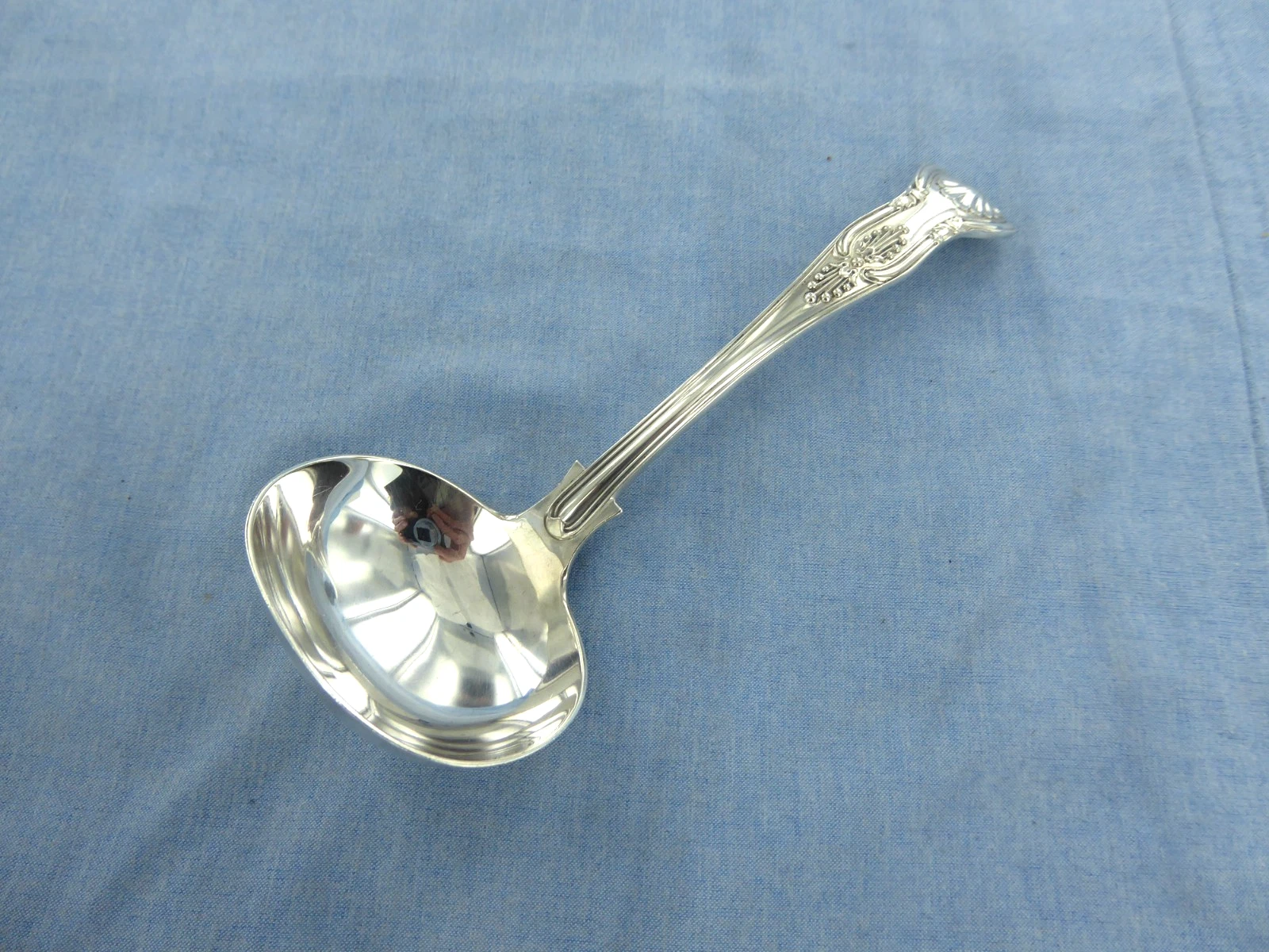AN ANTIQUE STERLING SILVER KINGS PATTERN SAUCE LADLE LONDON 1896.
Opens in a new window or tab