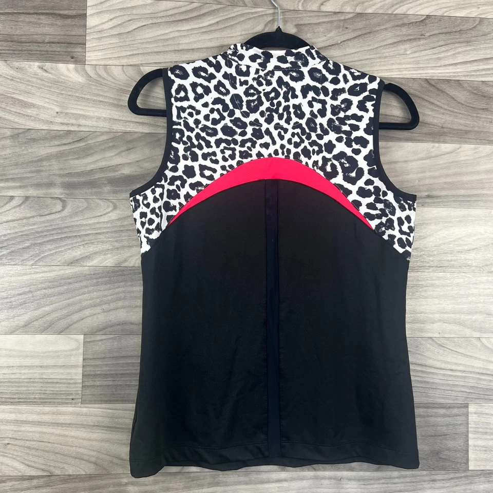 Top de golf Tail para mujer pequeño negro estampado de leopardo cuarto cremallera rendimiento pulóver Foto 2 de 4