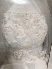 David's bridal wedding dress v9010 size 20w up was preserved company used once