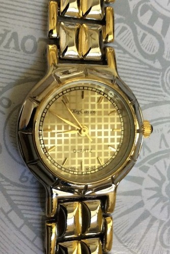 oleg cassini womens two-tone watch small round gold accented