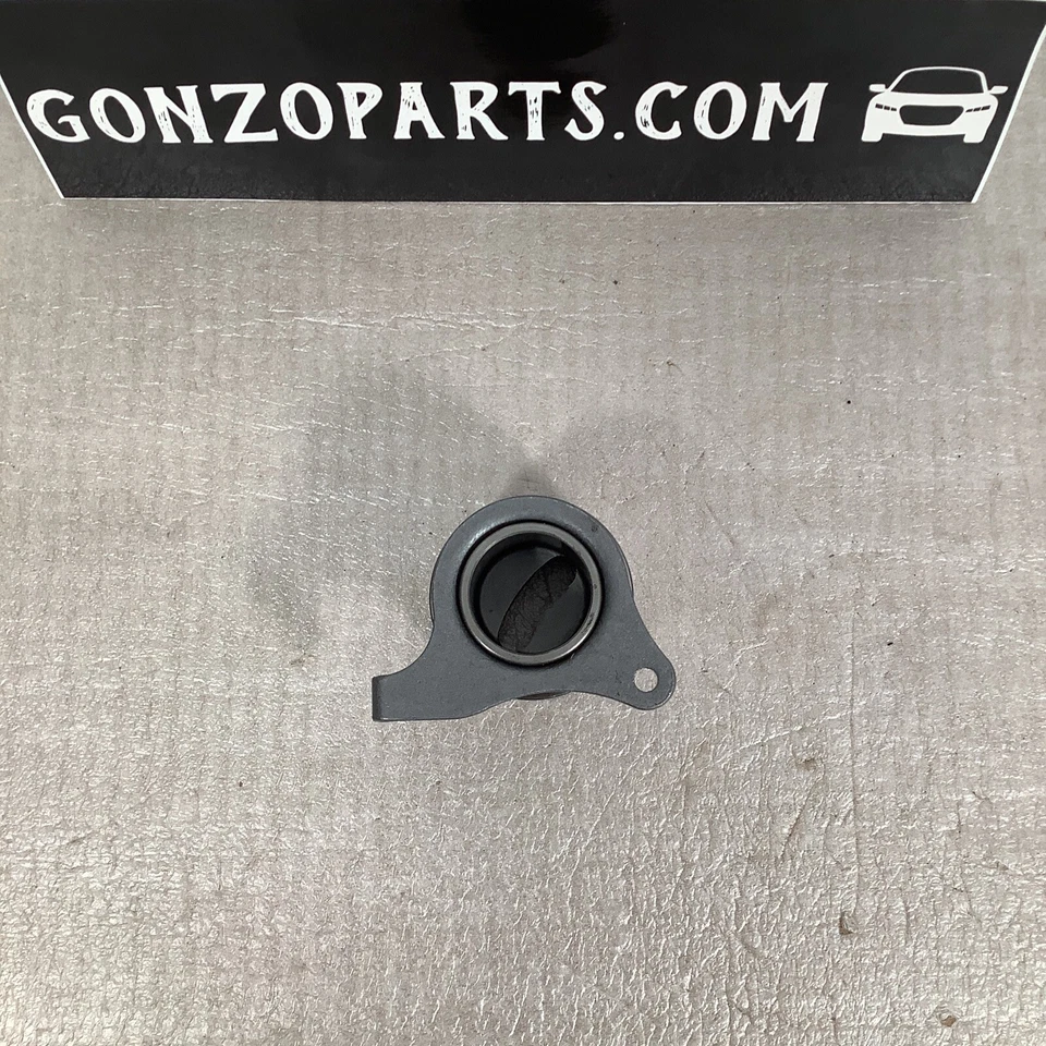 Оригинальный натяжитель ремня ГРМ 1995-1999 Toyota Tercel 1,5 л - Изображение 2 из 3