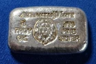 A Atlantis Mint LION- 1 oz .999 Fine Silver Hand Poured Bar