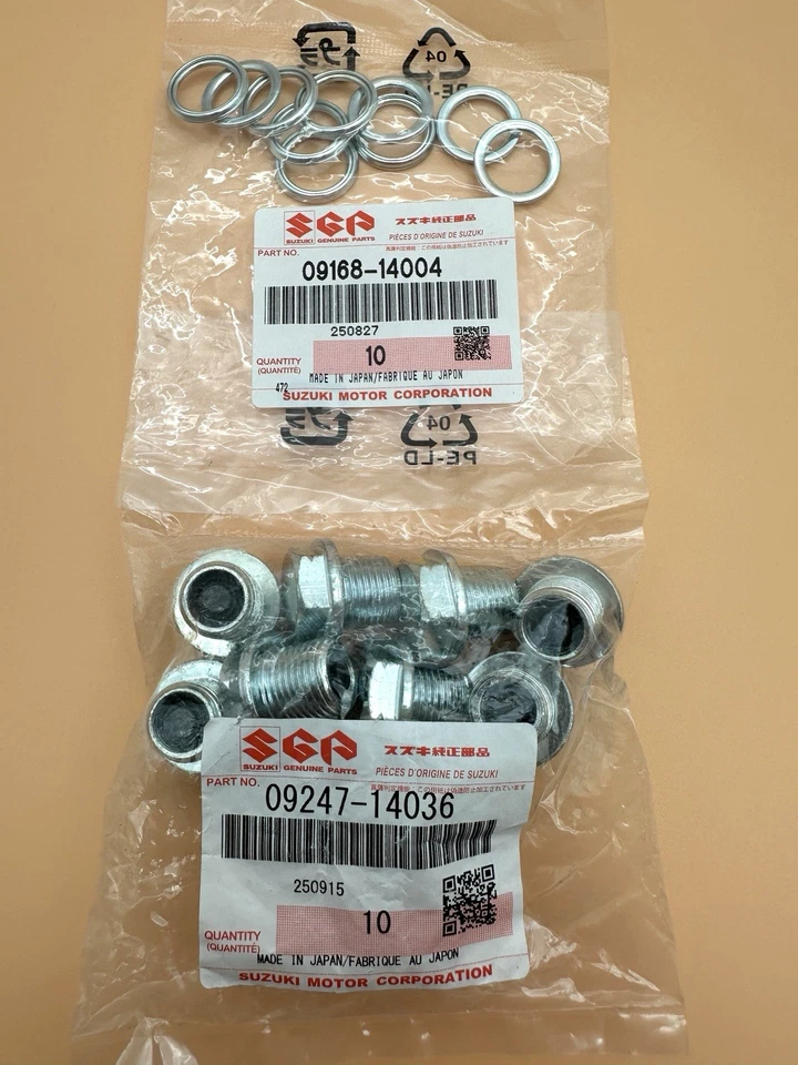 PAQUETE DE 10 TAPONES Y JUNTAS DE DRENAJE DE ACEITE ORIGINALES SUZUKI GSXR 600 750 1000 HAYABUSA Foto 3 de 4