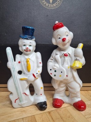 two clown figurines