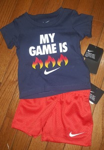 orange and black nike outfit