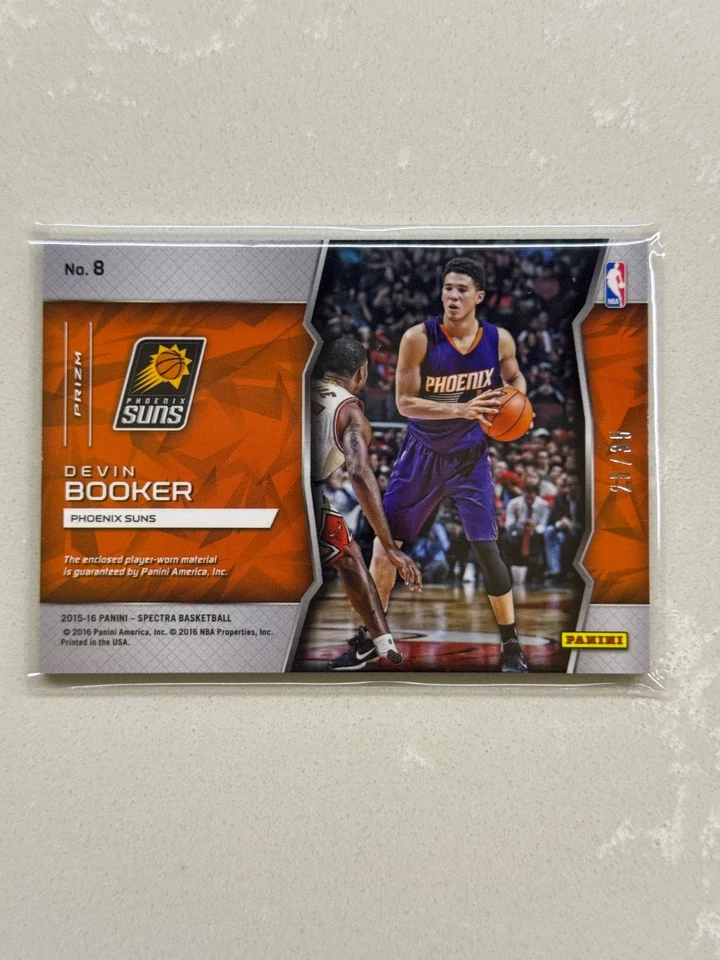 2015-16 Spectra Freshman Fabrics Silver Devin Booker Rookie Card (RC) #8 /35 - Image 2 of 2