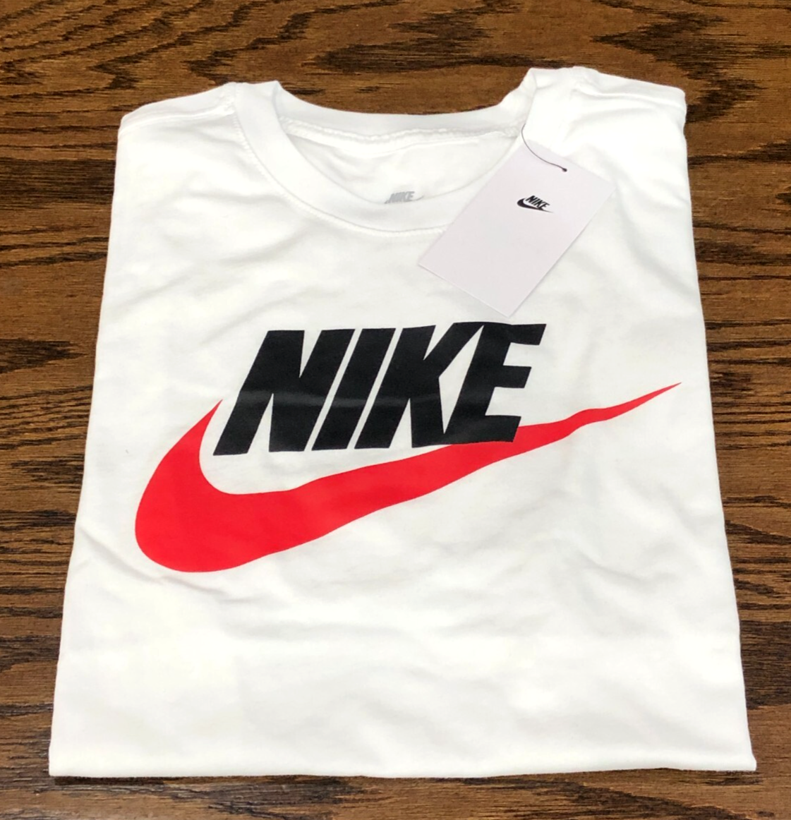 white and burgundy nike shirt