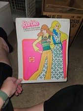 Vintage Barbie case and Assorted Clothes with Eight Barbies