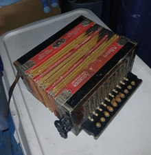 M. Hohner 22-Button 20 Treble/2 Bass Button Accordion Black/Red/Gold w Strap