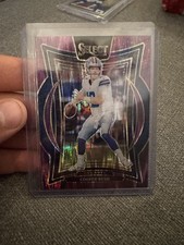 2024 Panini Select #22 Cooper Rush Purple Prizm Shock #/360 Dallas Cowboys