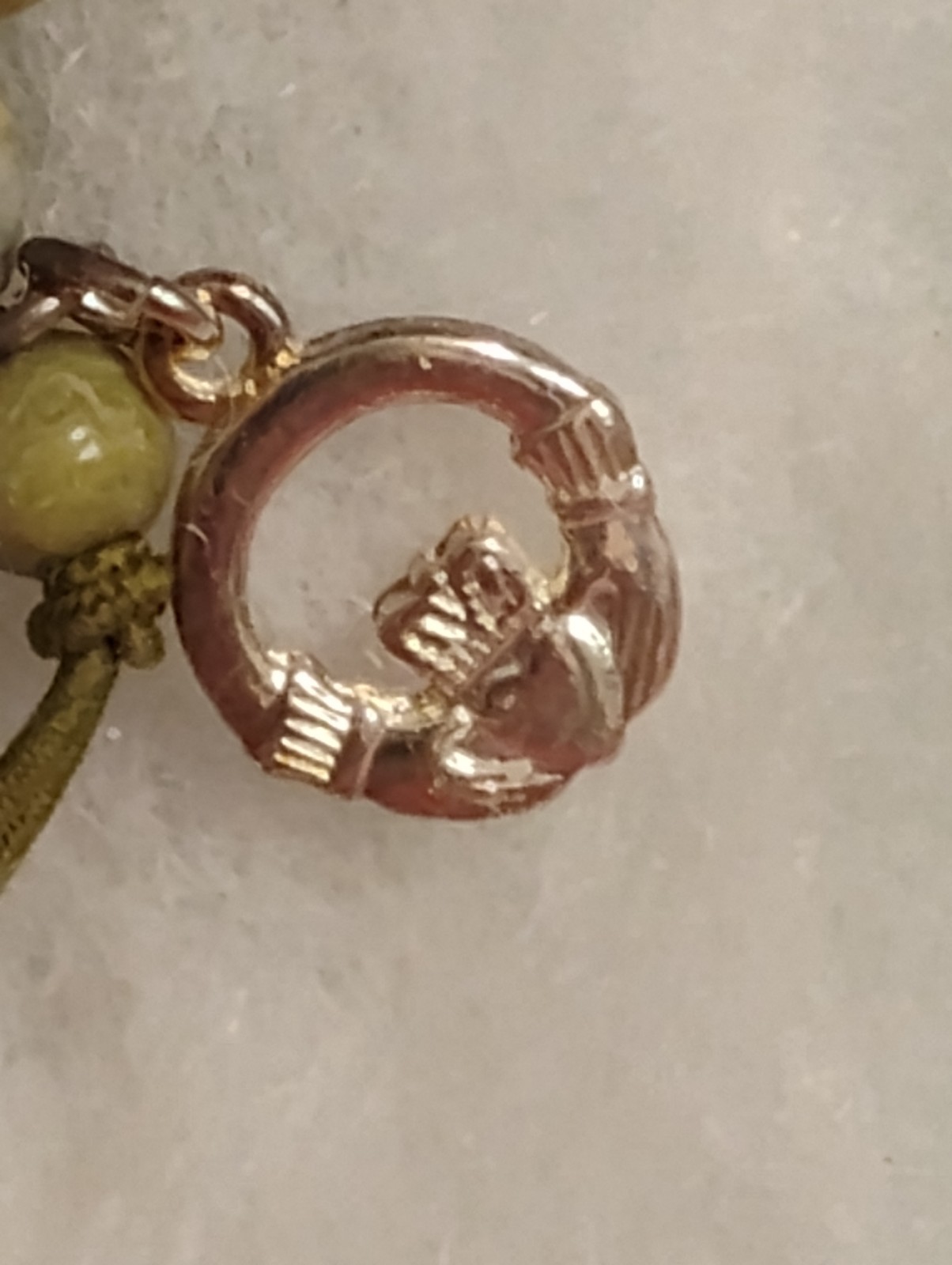 Connemara Marble Stretch Bracelet with a Claddagh Charm J.C. Walsh & Son