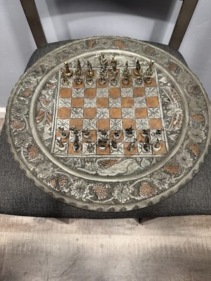 Handmade metal chess set.