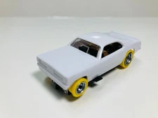 AUTO-WORLD ~" DUSTER " F/C unpainted YELLOW tires~NEW~AFX, AURORA, TYCO SALE $33