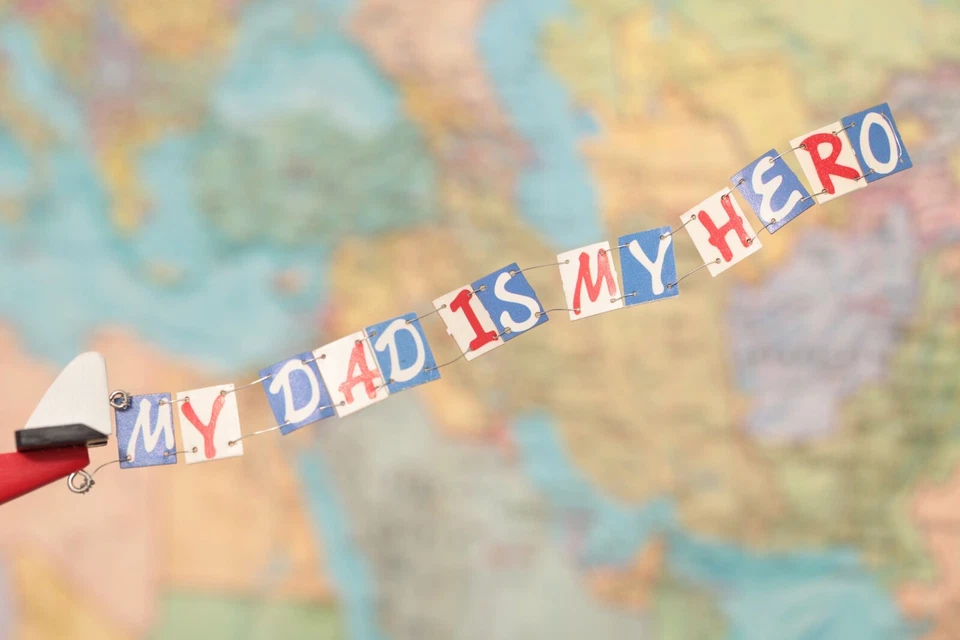 Personalized wooden plane with a congratulatory banner. Custom Hanging Biplane - Image 2 of 4