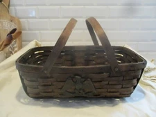 Antique market/gathering basket. Metal  eagle attached to basket. DoubleHandles.