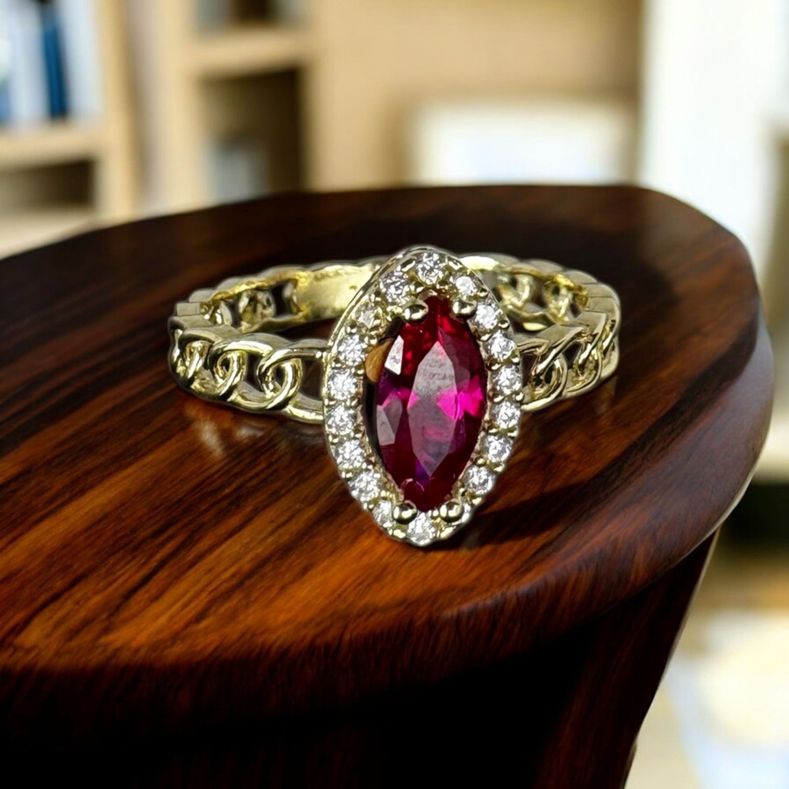 ANILLO ESLABON CHINO CON PIEDRA ROJA EN ORO 10 K