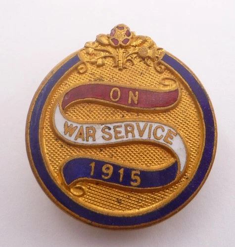 WW1 ON WAR SERVICE 1915 ENAMEL LAPEL BADGE - THOMAS FATTORINI