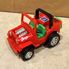 Jeep Plastic Friction Toy, works and is in good condition.