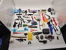 Vintage Action Figure Accessory Set with Weapons and Gadgets Collection