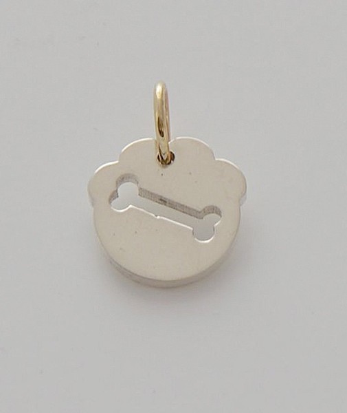 SilberanhäNger Mit FußAbdruck-Silhouette Und Durchbohrtem Knochen, Goldene Gegen-image