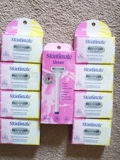 Skintimate 4-Blade Razor 1 Handle 34 Refill Cartridges