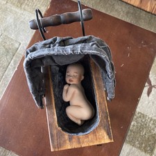Vintage Baby Carriage With Baby Doll In The Carriage.