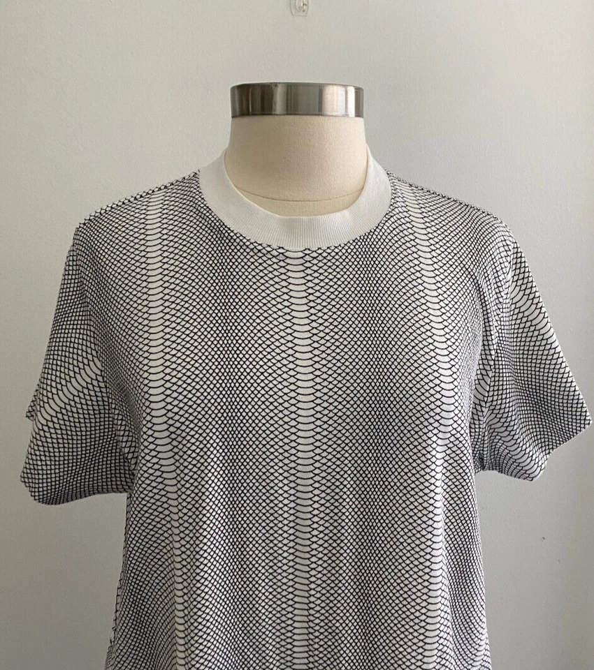 Camiseta deportiva Stella McCartney Adidas blanca y negra de malla manga corta talla pequeña Foto 2 de 4