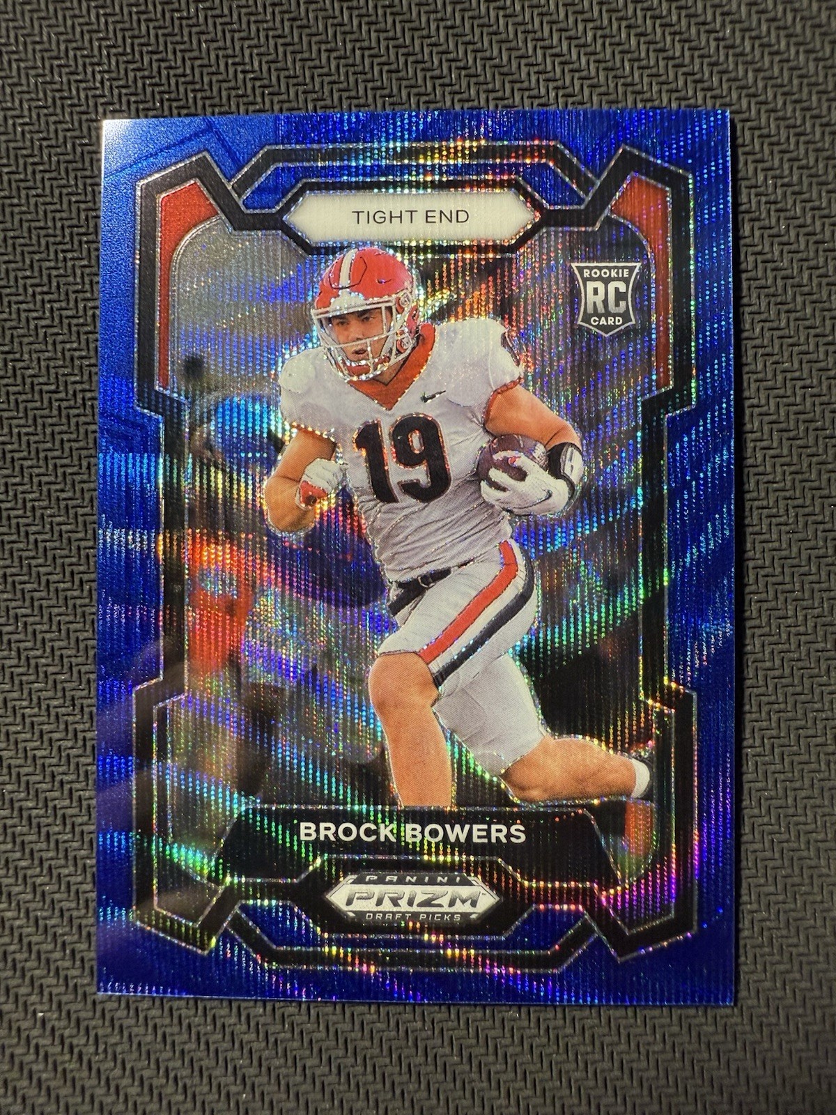Brock Bowers 2024 Panini Prizm Draft Picks Blue Wave Prizm RC /249 #107 Bulldogs