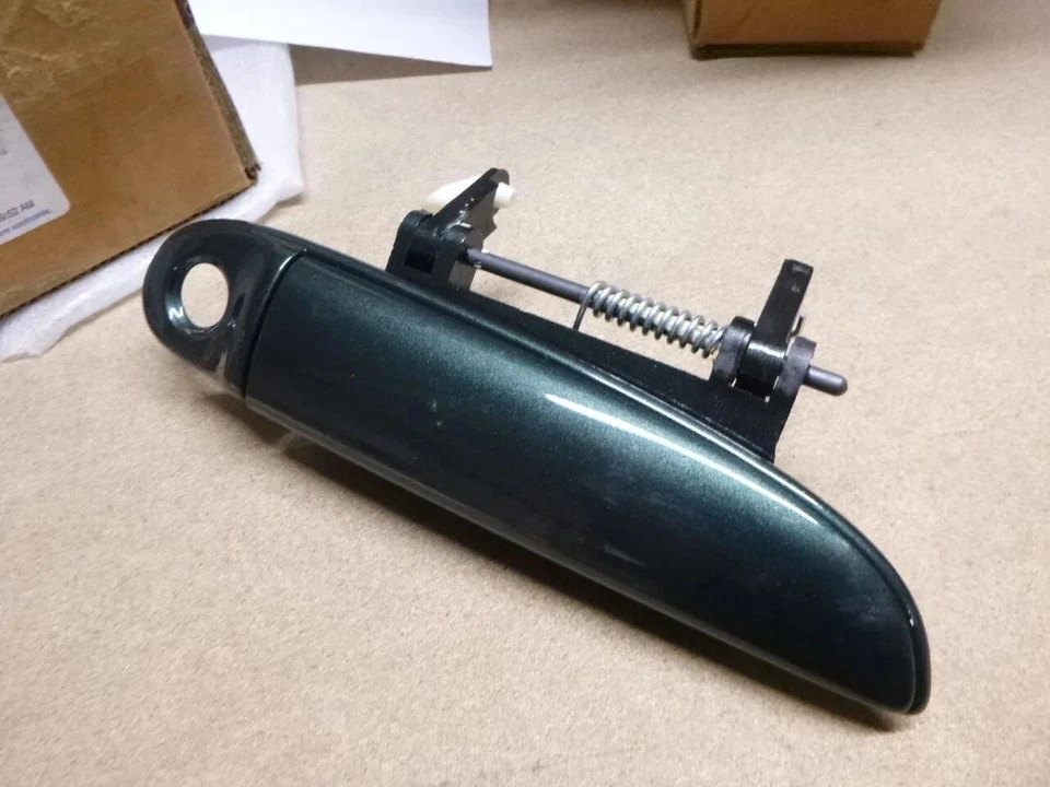 Manija de puerta delantera derecha Chrysler Cirrus Sebring Stratus Foto 4 de 4