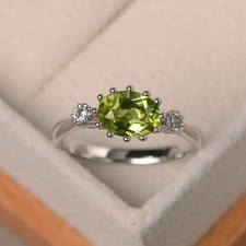 2CT Peridot Oval Gemstone 925 Silver Plated Three Stone Ring Duty Free