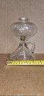Antique clear glass oil lamp featuring a side finger handle for portability — photo 3