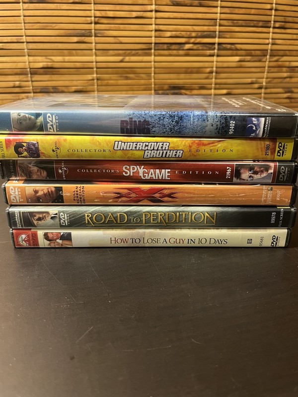 lot of dvds; **Full screen movies** from 90's/00's; viewed/works; 6 movie on DVD