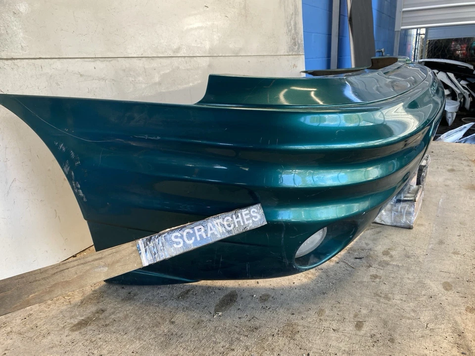 Cubierta del parachoques trasero Pontiac Grand AM GT 1999-2005 OEM Foto 3 de 4