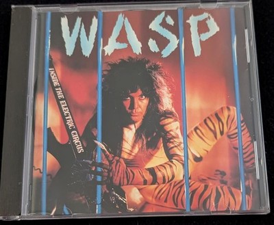 CD Wasp / W.A.S.P. - Inside the Electric Circus / Album 1986 / Pressung Capitol