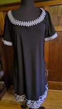 Easy wear Ronni Nicole black knit dress with decorative trim