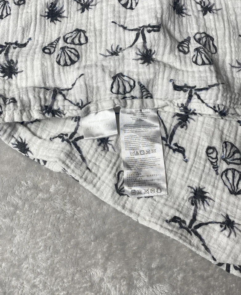 Manta de bebé etiqueta blanca Aden & Anais palmera concha de mar muselina envoltura Lovey Foto 3 de 4