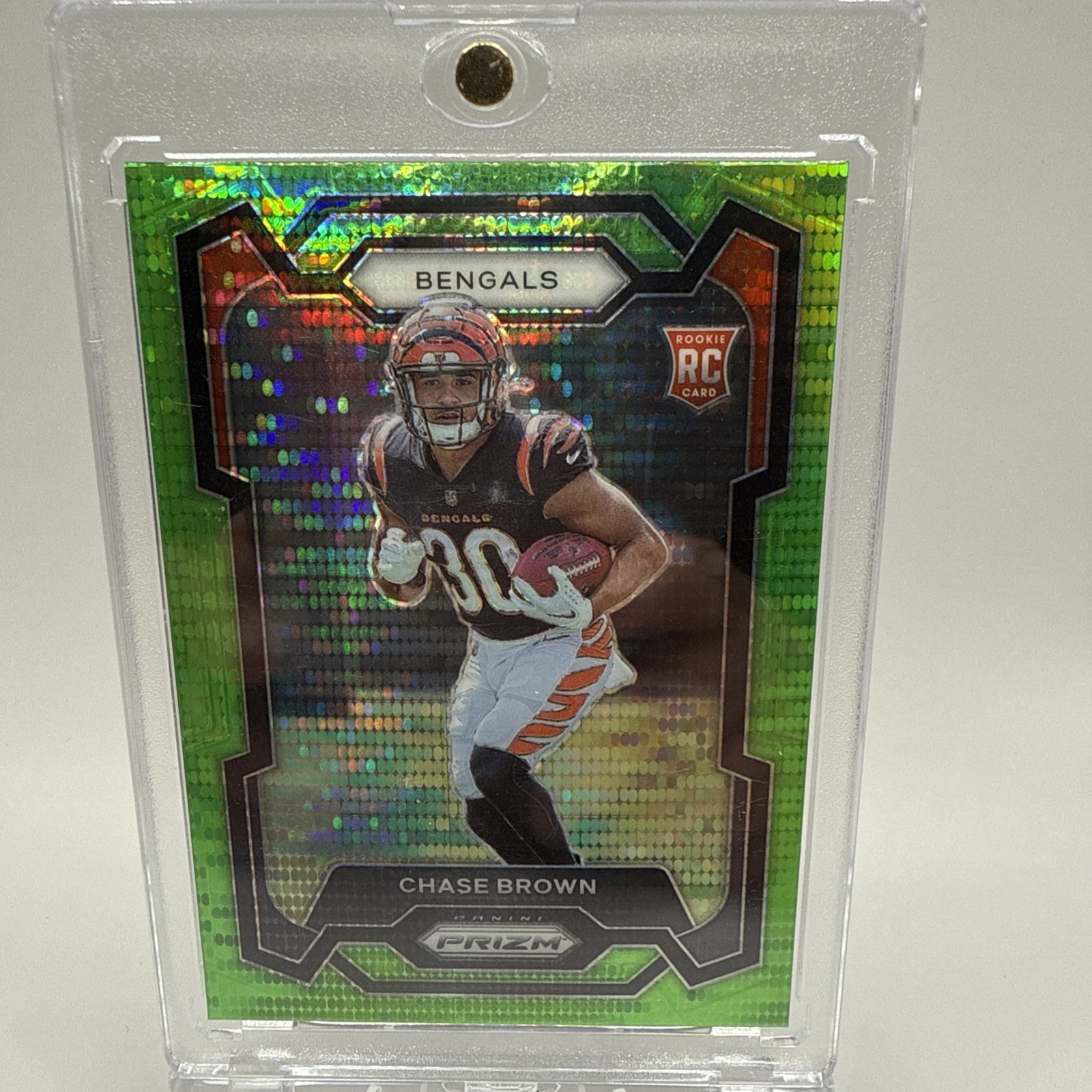 2023 Panini Prizm - Rookies Neon Green Pulsar Prizm #318 Chase Brown (RC)