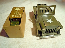 2 VINTAGE JAPANESE TIN MILITARY JEEPS - ONE IN ORIGINAL BOTTOM HALF OF BOX.
