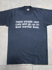 Funny "Many People own cats & go on to lead normal lives" T-shirt, black, size M