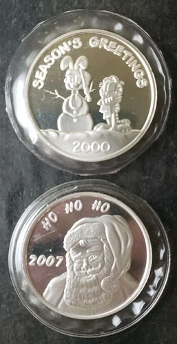 2000 and 2007 Christmas 1oz Silver Rounds in Plastics
